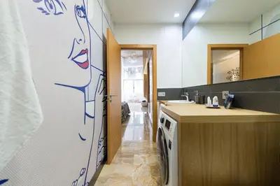 Una cocina o zona de cocina en Suites Garden Loft Roy Lichtenstein