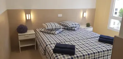 Cama o camas de una habitación en Stylish Apartment