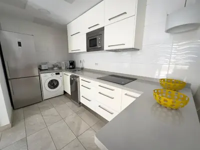 Una cocina o zona de cocina en Holiday Club Playa Amadores