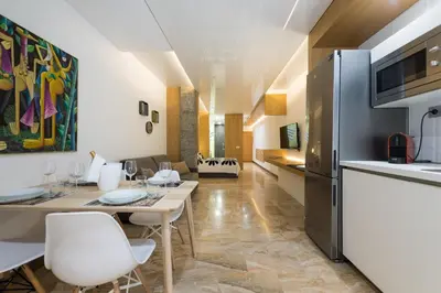 Una cocina o zona de cocina en Suites Garden Loft Andy Warhol