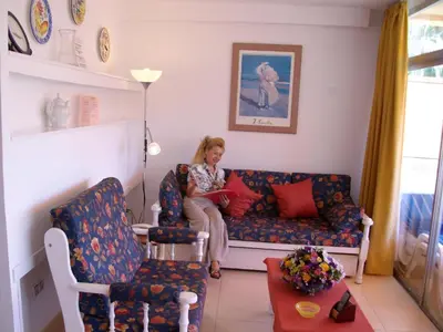 Zona de estar de Apartamentos Belmonte