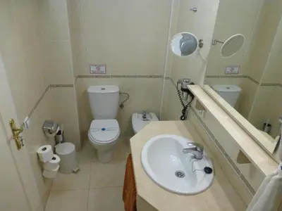 Un baño de Apartamentos Belmonte