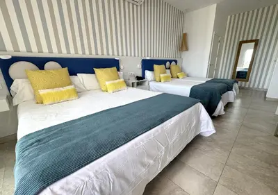 Cama o camas de una habitación en Holiday Club Jardin Amadores