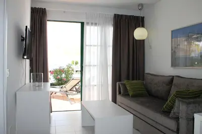 Zona de estar de Apartamentos Babalu
