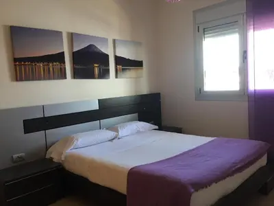 Cama o camas de una habitación en Apartamento Atlántico
