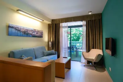 Una televisión o centro de entretenimiento en Apartamentos Cordial Mogán Valle