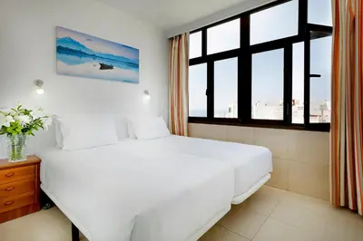 Cama o camas de una habitación en Crisol Faycán