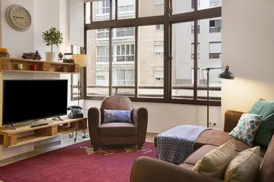 Una televisión o centro de entretenimiento en Vcv Apartamento San Telmo
