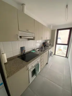 Una cocina o zona de cocina en Holiday Home & Rooftop Lounge