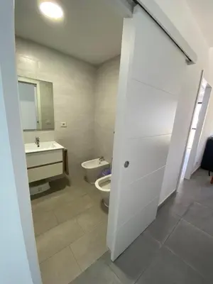 Un baño de Holiday Home & Rooftop Lounge