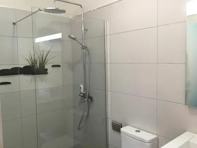 Un baño de Sunset Puerto de Mogan