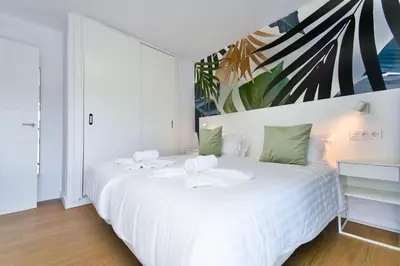 Cama o camas de una habitación en Palm Suites