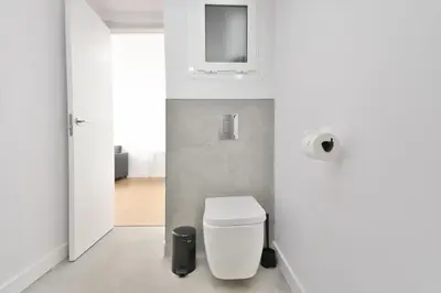 Un baño de Palm Suites