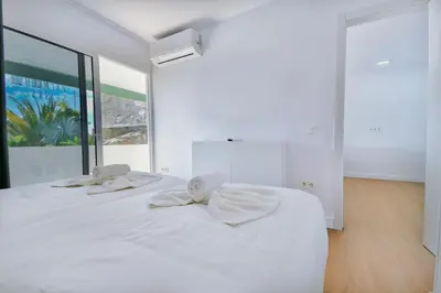 Cama o camas de una habitación en Palm Suites