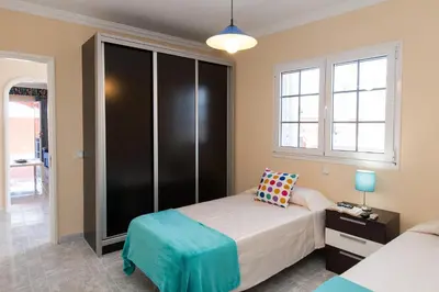 Cama o camas de una habitación en Sol y Mar El Salobre