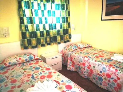 Cama o camas de una habitación en Apartamento PEPE Complejo LAS OLAS