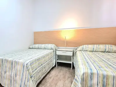 Cama o camas de una habitación en Bungalows Teresa