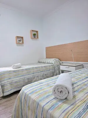 Cama o camas de una habitación en Bungalows Teresa