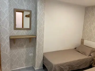 Cama o camas de una habitación en Peña la Vieja Apartment