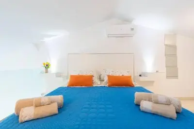 Cama o camas de una habitación en Lidia & Paco Home two bedrooms beachfront