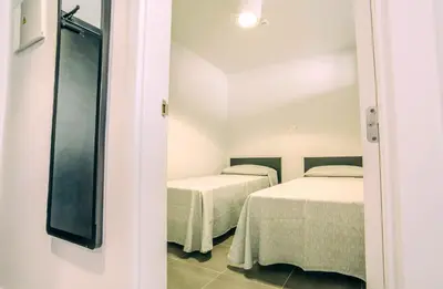 Cama o camas de una habitación en Mannix Urban Apartments