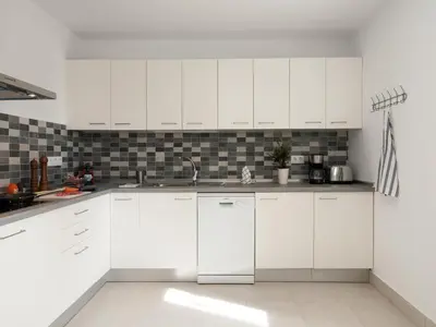 Una cocina o zona de cocina en Bungalow San Agustin Rocas Rojas by VillaGranCanaria