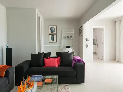 Zona de estar de Bungalow San Agustin Rocas Rojas by VillaGranCanaria