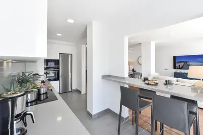 Una cocina o zona de cocina en Apartamentos Don Carlos