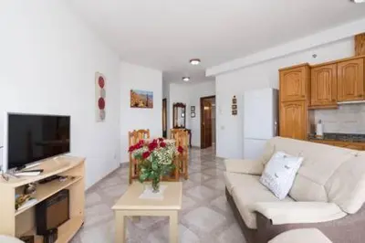 Una televisión o centro de entretenimiento en Apartamentos Castillo Mar Gran Canaria