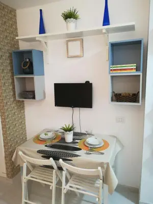 Una televisión o centro de entretenimiento en Apartamento Beach Loft Las Canteras