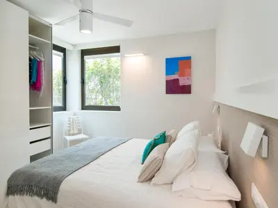 Cama o camas de una habitación en Beachfront Apartment Siesta 21 San Agustin Playa by VillaGranCanaria