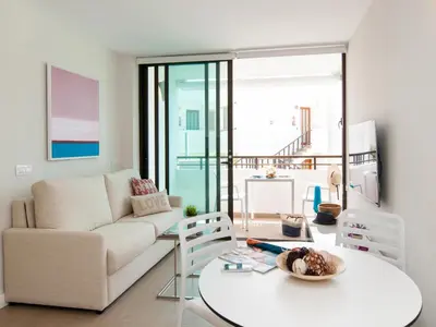 Zona de estar de Beachfront Apartment Siesta 21 San Agustin Playa by VillaGranCanaria