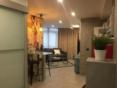 Zona de estar de Piso con piscina y garaje en la Playa de Las Canteras