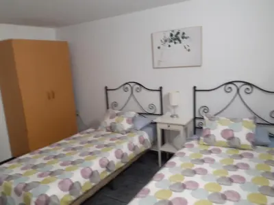 Cama o camas de una habitación en Casa Mina