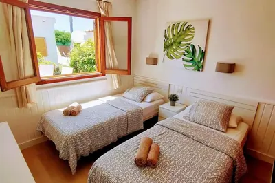 Cama o camas de una habitación en Precioso Bungalow 4 by CASAS COCODRILO