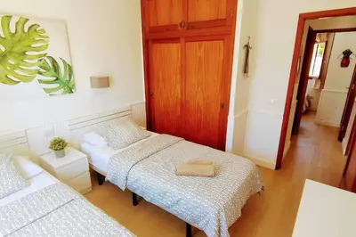 Cama o camas de una habitación en Precioso Bungalow 4 by CASAS COCODRILO