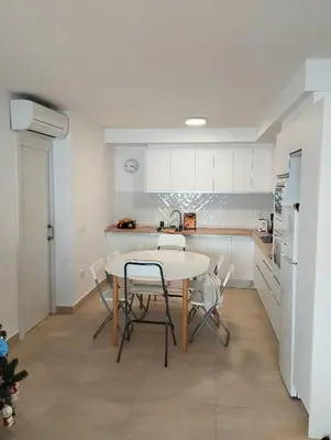 Una cocina o zona de cocina en Casa Daura Playa de Arinaga Beach Front