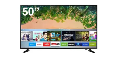 Una televisión o centro de entretenimiento en Moderno apartamento con vistas al mar