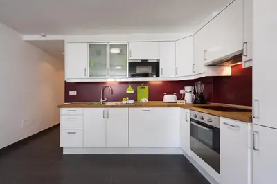 Una cocina o zona de cocina en Apartamentos Karma