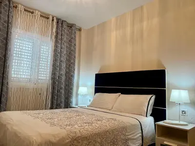Cama o camas de una habitación en Apartamentos Dalia