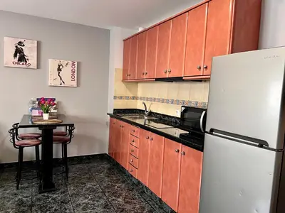 Una cocina o zona de cocina en Apartamentos Dalia