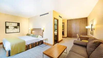 Cama o camas de una habitación en Bull Astoria