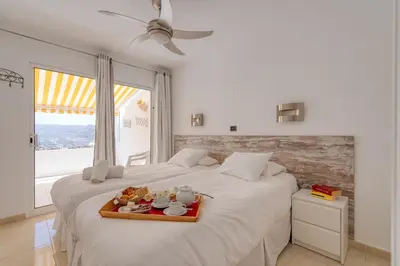 Cama o camas de una habitación en Artemisa Penthouse - Monsenor Apts