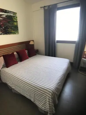 Cama o camas de una habitación en Las Palmas Penthouse