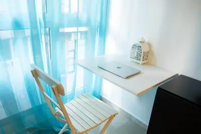 Una televisión o centro de entretenimiento en Las Palmas Lighthouse Apartment