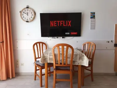 Una televisión o centro de entretenimiento en Apartamentos Bogota