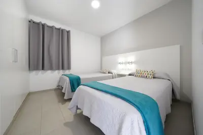 Cama o camas de una habitación en ConMar