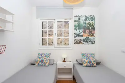 Zona de estar de GuestReady Casa Carmen Agaete con terraza y vistas al mar