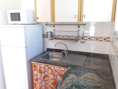 Una cocina o zona de cocina en City Beach Home 60