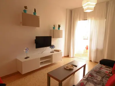 Una televisión o centro de entretenimiento en Apartamento Garland Agaete Parque